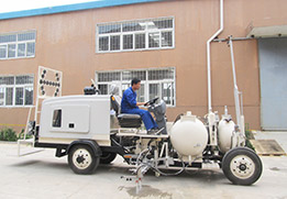 Machine de marquage routier à peinture froide